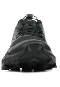 Black athletic shoe with a textured upper, reinforced heel, and a rugged outsole featuring deep tread for traction. Adjustable lacing system.