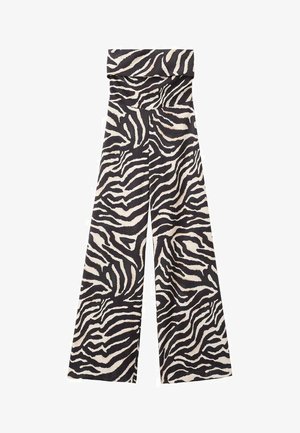 Pantalon à jambes larges en tissu doux présentant un imprimé zèbre noir et crème audacieux, avec une ceinture pliée et un design fluide.