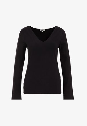 Must have mustakaltne V-kaelusega särk, mis on valmistatud pehmest puuvillakangast. Omab vormi kohandavat lõiget ja sujuvat tekstuuri, ilma nähtavate mustrite või aktsendita.