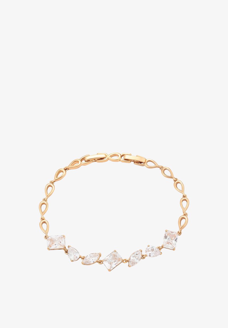 Aukso atspalvio apyrankė su pakaitiniais ašarų formos ir geometriniais skaidraus kristalo akcentais. Lygaus paviršiaus su saugiu užsegimo mechanizmu.