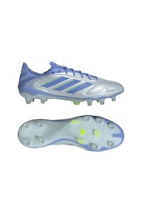 Light blue soccer cleats with a shiny silver upper, featuring three dark blue stripes and yellow accents. Transparent outsole with molded studs.