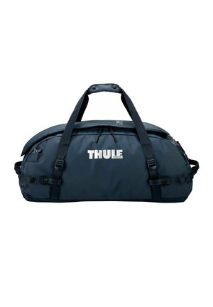 Sac de sport bleu marine Thule avec doubles poignées noires, compartiment principal zippé et sangles latérales réglables, présenté sur fond blanc.