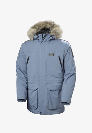 Parka d'hiver bleu clair avec capuche bordée de fourrure, fermeture éclair frontale, deux poches zippées sur la poitrine, deux poches à rabat, et logo "HH" sur la poitrine et la manche.