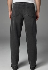 Next VINTAGE STRETCH AUTHENTIC - Traperice opuštenog kroja - black washed
