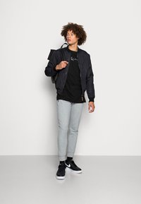 Antony Morato TROUSERS SUPER IN STRETCH TERRY - Calças de fato de treino - grey melange medium