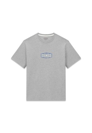 Szürke pamut póló, elöl egy kék "GUESS JEANS" logóval, körvonalazott téglalapban. Rövid ujjú és kerek nyakú kivitel.