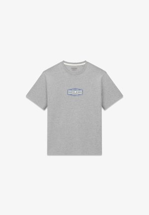 Grijs T-shirt van katoen met een blauwe "GUESS JEANS"-logo in een omrande rechthoek aan de voorkant. Korte mouwen en een ronde hals.
