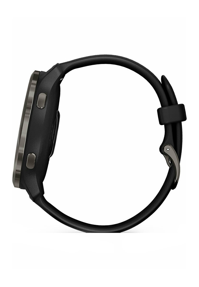 Schwarze analoge Uhr mit mattem Finish, ausgestattet mit einem runden, dunklen Gehäuse, auffälligen Tasten, einer strukturierten Lünette und einem glatten schwarzen Armband.