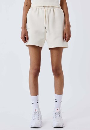 STRASSY - Pantalones deportivos - crème camel