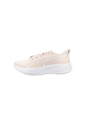 Zapatilla deportiva para correr de color beige claro con logotipo blanco de Puma y suela blanca acolchada, mostrada en perfil lateral sobre fondo blanco.
