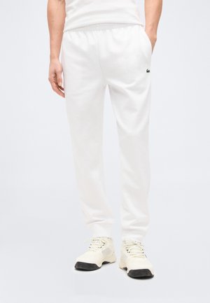 - Spodnie treningowe