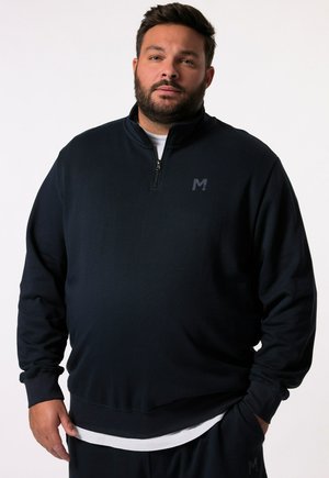 Marineblauer Zip-Hoodie mit gerippten Bündchen und Saum, ausgestattet mit einem dezenten Logo auf der Brust und einem hohen Kragen.
