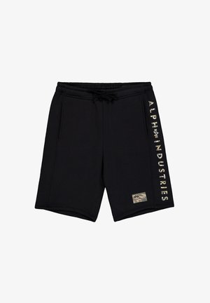 Melni šorti, kas izgatavoti no kokvilnas un sintētiskās šķiedras maisījuma, ar dekoratīvo šuvju, divām sānu kabatām un izteiksmīgu "ALPHA INDUSTRIES" tekstu uz kreisā kājā.