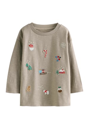 Sweat-shirt beige clair à manches longues avec broderies décoratives comprenant des motifs de Père Noël, de canne en sucre, d'ours polaire, d'arbres et de traîneau.