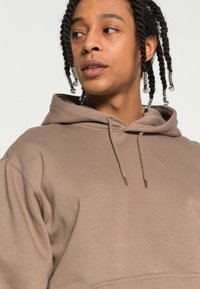 Weekday STANDARD HOODIE - Sweatshirt com capuz - dusty mole