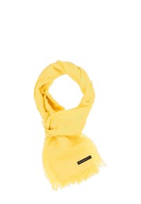 Yellow scarf made of soft material, featuring a frayed edge and a small black label with the brand name. оформлен в виде петли.