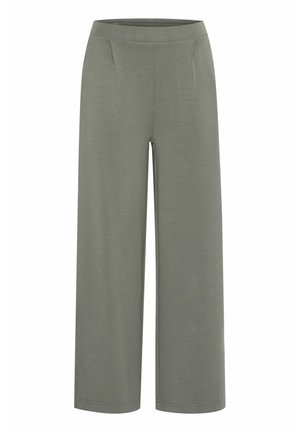 Weite Hose aus sanftem olivgrünen Stoff. Mit glatter Textur, elasticem Bund und zwei Vorderhosentaschen. Einfaches Design.
