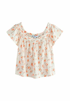 Bluza crem cu mânecă scurtă, cu imprimeu portocaliu de cireșe și text cursiv negru împrăștiat, decolteu pătrat și detalii adunate în față.