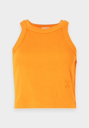 Ribbad orange linne med hög hals och ärmlös design. Har subtil loggdetalj vid fållen. Mjuk, elastisk material.
