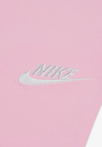 Nike Sportswear FLARE  - Pantalon de survêtement - medium soft pink