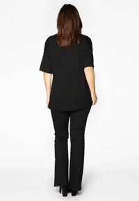 YOEK Flared jeans - black