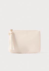 Texturált anyagból készült bézs színű cipzáras neszesszer, díszes bojttal és aranyszínű fémrészekkel. Kompakt, téglalap alakú.