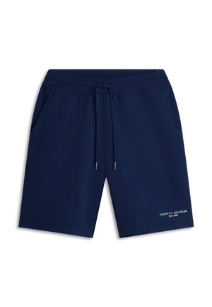 Shorts bleu marine en tissu doux, dotés d'une ceinture élastique avec cordon de serrage, de poches latérales et d'un logo imprimé sur le bas de la jambe.