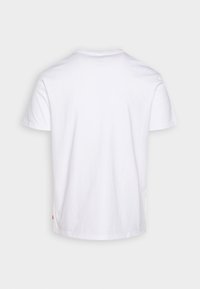 Hvit bomull T-skjorte med rund hals, korte ermer og rett kant. Minimalistisk design, uten mønstre eller grafiske elementer.