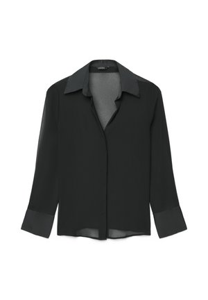 Blouse noire à manches longues avec un col classique, tissu transparent et fermeture à boutons. Les poignets présentent un détail de texture contrastante.
