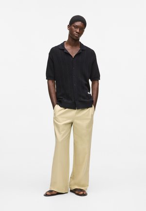 Nadrágok - pale khaki