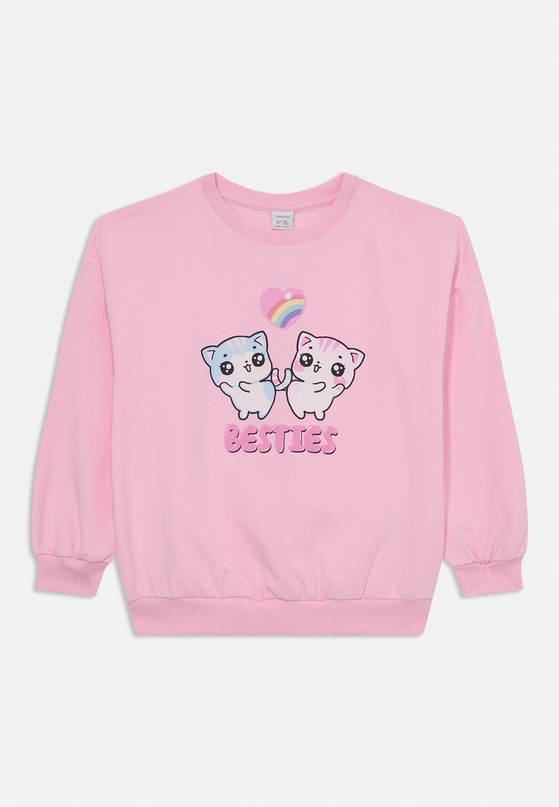 Pink sweatshirt featuring two cartoon cats holding a heart with a rainbow. Text below reads "BESTIES." Material appears soft with ribbed cuffs.
