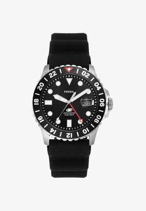 Zwart analoog duikhorloge van Fossil met zwarte siliconen band, witte uurmarkeringen, datumnummer en draaibare 24-uurs ring.