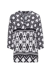 Blouse noir et blanc avec des motifs géométriques, décolleté en V, manches trois-quarts, et en tissu doux avec une coupe ample.