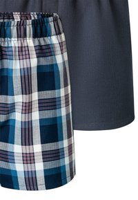 Men's shorts featuring a gray solid fabric and a plaid design in blue, navy, and white, with an elastic waistband for comfort.