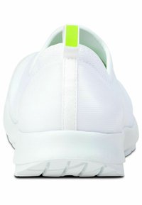 White athletic shoe featuring a textured upper, rounded shape, and a yellow-green pull tab on the heel for easy wear.