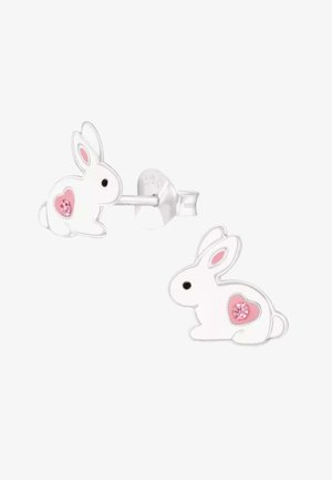 Orecchini a forma di coniglio bianco con accenti a forma di cuore rosa e una pietra preziosa rosa. Realizzati in metallo con finitura lucida. Chiusura a perno sicura per l'uso.