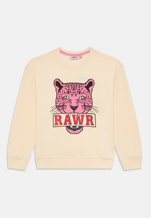 Sudadera crema de mangas largas con un gráfico de una cabeza de leopardo rosa sosteniendo un cartel que dice "RAWR" en letras rojas.