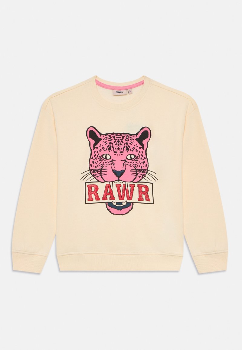 Krémová mikina s dlhým rukávom, na ktorej sa nachádza grafika ružovej leopardej hlavy s nápisom "RAWR" v červených písmenách.