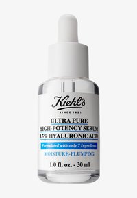 Flacon compte-gouttes en verre transparent avec un capuchon compte-gouttes blanc. L'étiquette indique "Sérum ultra pur haute concentration 1,5 % d'acide hyaluronique" en texte noir et bleu.