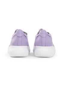 Lilac leather sneakers with a smooth texture, rounded heel, and white rubber sole. Features understated stitching and a subtle back tab.