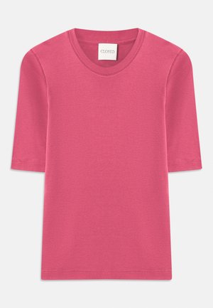 Short-sleeve, round-neck T-shirt in vibrant pink cotton fabric. Features clean seams and a soft texture. Brand label visible at the neckline.