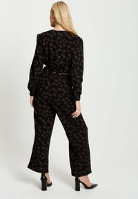 Liquorish Jumpsuit - black