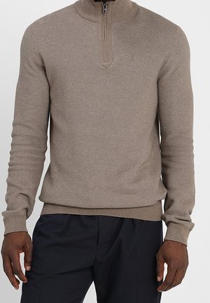 Stickad tröja - beige