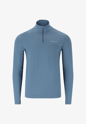 Langærmet sportspullover i lys blå, lavet af elastisk, åndbart stof. Har en halv lynlås ved halsen og diskrete logo detaljer.