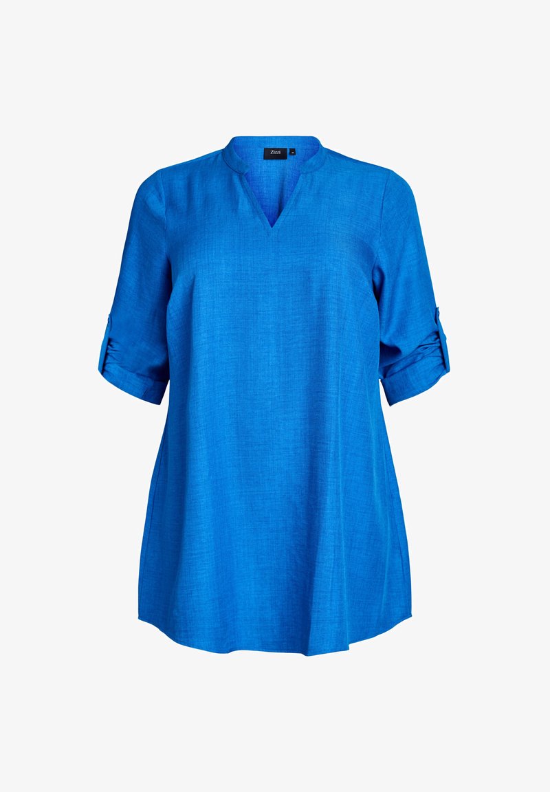 Sinine lühikeste varrukatega tunika, millel on V-kujuline kaelus; sellel on rullitud varrukad ja kerge kangastekstuuri.