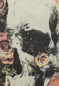 Cotton fabric featuring a skull print with colored roses. Black studs arranged in a grid pattern on the skull's forehead.