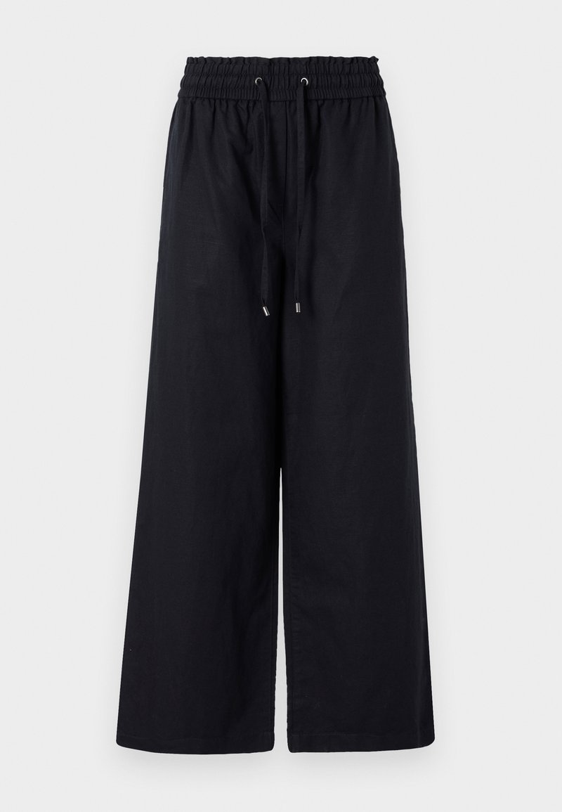 Schwarze, locker sitzende, cropped Hosen mit einem elastischen Kordelzugbund. Weiche Textur, keine sichtbaren Verzierungen oder Muster.