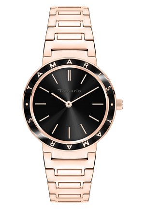 Montre analogique noire avec un cadran rond, bracelet en métal rose doré et un design élégant. Présente un cadran noir avec des index horaires minimalistes.