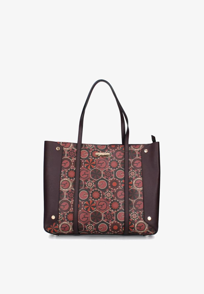 Bruine en kastanjebruine tote bag met gepatterniseerde hexagons en bloemmotieven, twee handvatten en goudkleurige studs op leren zijpanelen.