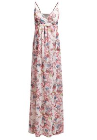 Robe maxi florale à fines bretelles, présentant un design enveloppant. Le matériau est léger et fluide, orné de motifs floraux roses, bleus et verts.
